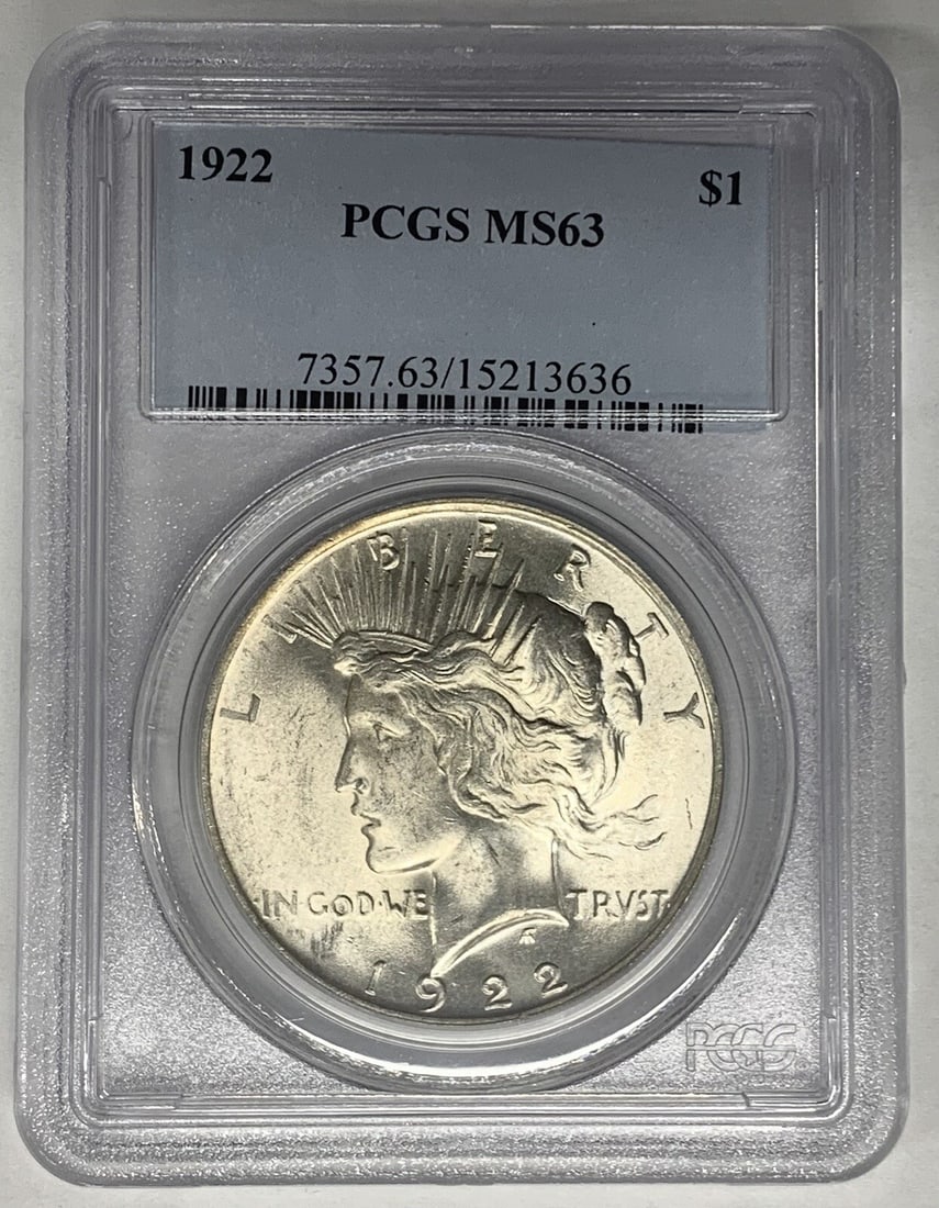 PCGS MS 63 1922 Silver Peace Dollar Certified Uncirculated Coin: PCGS MS 63 1922 Silver Peace Dollar Certified Uncirculated Coin This is a 1922 Peace Silver Dollar coin graded MS 63 by PCGS. The coin is uncirculated and composed of silver, originating from the Unit