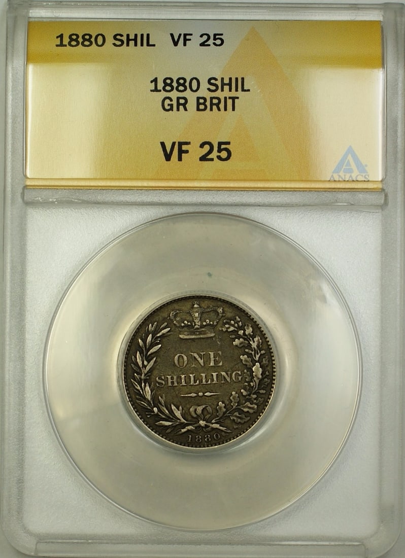 1880 United Kingdom Silver Shilling Certified ANACS VF 25: 1880 United Kingdom Silver Shilling Certified ANACS VF 25 This is an 1880 Great Britain 1 shilling silver coin, certified by ANACS with a grade of VF-25. The coin is made of silver, originates from th