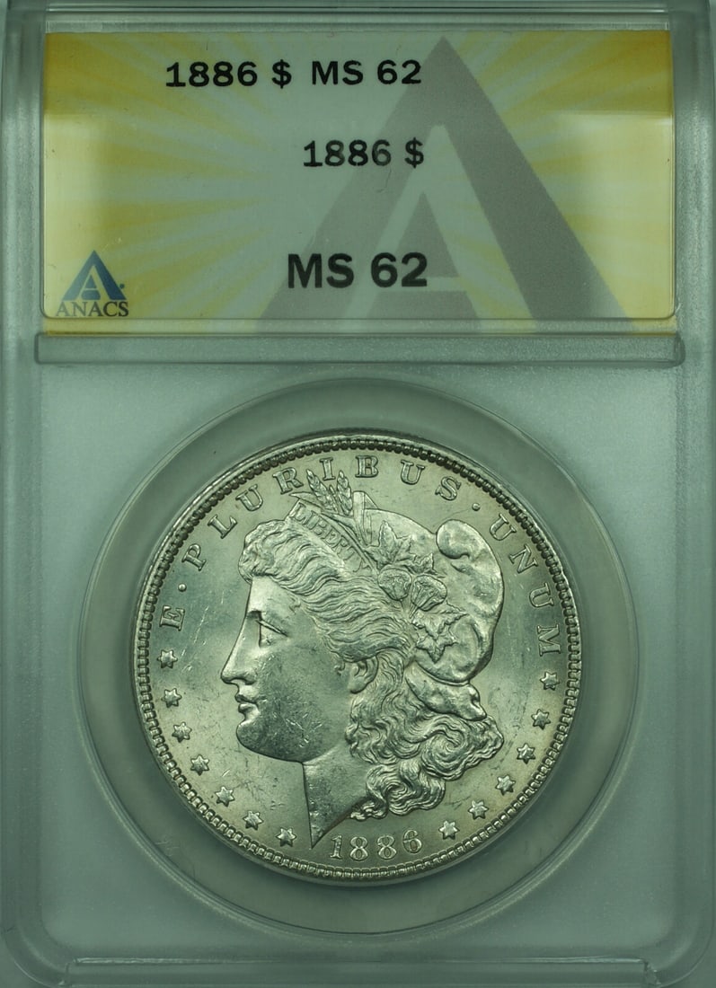 1886 $1 Morgan Dollar ANACS MS62 Silver Coin: 1886 $1 Morgan Dollar ANACS MS62 Silver Coin This 1886 Morgan Silver Dollar is an uncirculated $1 coin graded MS-62 by ANACS. Struck at the Philadelphia Mint, it is composed of silver with a fineness