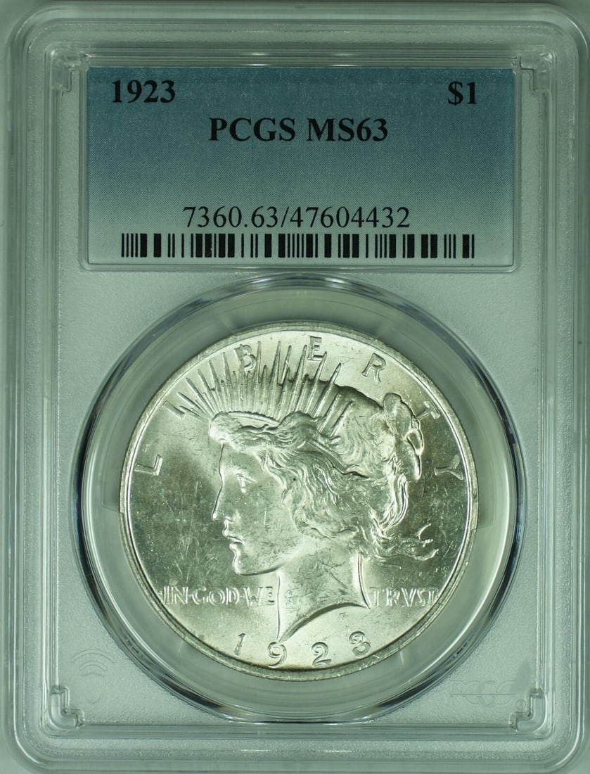PCGS MS 63 Certified 1923 Peace Dollar Silver Coin $1 Uncirculated: PCGS MS 63 Certified 1923 Peace Dollar Silver Coin $1 Uncirculated This is a 1923 Peace Silver Dollar $1 coin graded MS 63 by PCGS. The coin is uncirculated and features the iconic Peace design. It is