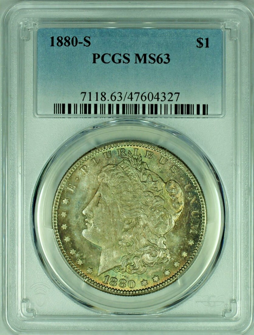 PCGS MS 63 1880-S Morgan Dollar with Vibrant Toning: PCGS MS 63 1880-S Morgan Dollar with Vibrant Toning This 1880-S Morgan Silver Dollar features a colorful tone and is graded MS 63 by PCGS. The coin is uncirculated and composed of silver, representing