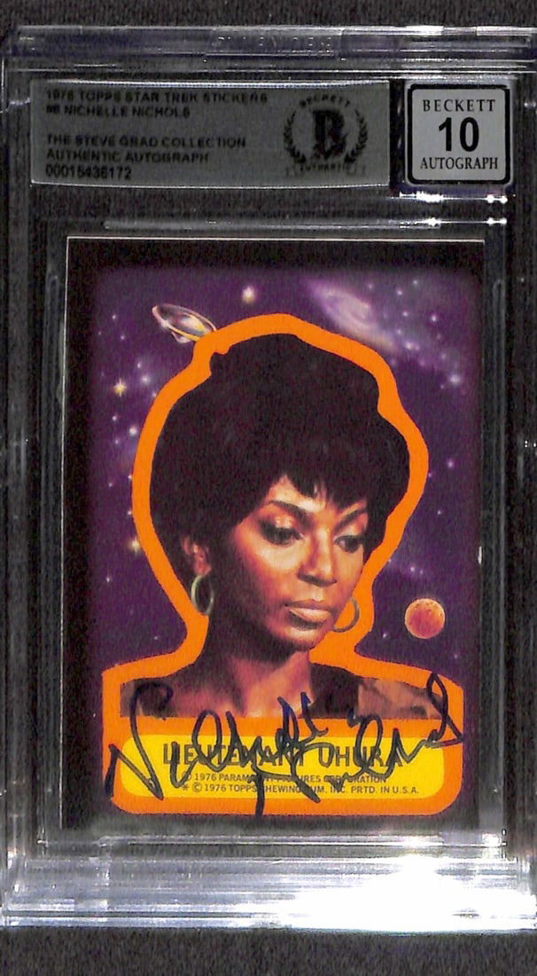 Nichelle Nichols Signed 1976 Topps Star Trek Stickers #8 Card Auto 10 Beckett: Nichelle Nichols Signed 1976 Topps Star Trek Stickers #8 Card Auto 10 Beckett This is an autographed 1976 Topps Star Trek Stickers #8 card featuring Lieutenant Uhura, signed by Nichelle Nichols in blu