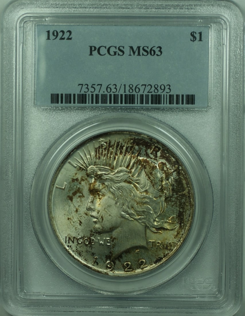PCGS MS-63 1922 Peace Dollar Silver Coin Toned Philadelphia Mint: PCGS MS-63 1922 Peace Dollar Silver Coin Toned Philadelphia Mint This is a 1922 Peace Silver Dollar $1 coin from the United States, certified by PCGS with a grade of MS-63. The coin is uncirculated wi