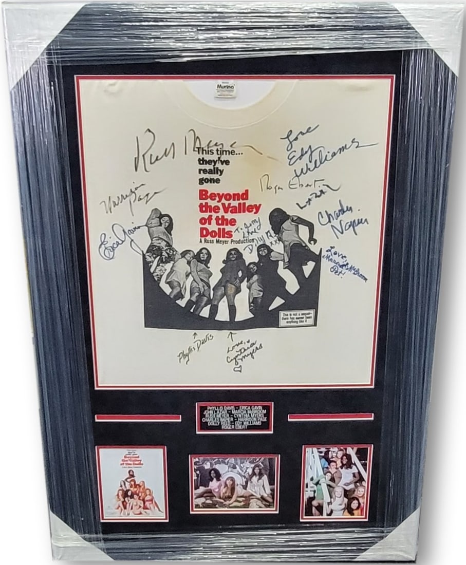 Beyond the Valley of the Dolls Signed Cast T-Shirt Framed JSA: Beyond the Valley of the Dolls Signed Cast T-Shirt Framed JSA This unique framed collage features hand-signed autographs from the cast of the cult classic film, Beyond the Valley of the Dolls. The sig