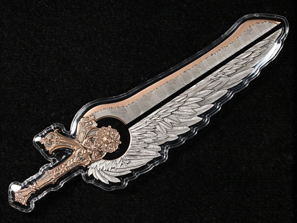 2025 Korea 2.5oz Silver Sword of St. Uriel Pink Gold Gilt Display OGP: 2025 Korea 2.5oz Silver Sword of St. Uriel Pink Gold Gilt Display OGP Presenting the 2025 Korea 2.5oz Silver Sword of St. Uriel, elegantly adorned with pink gold gilt and accompanied by a display. Thi