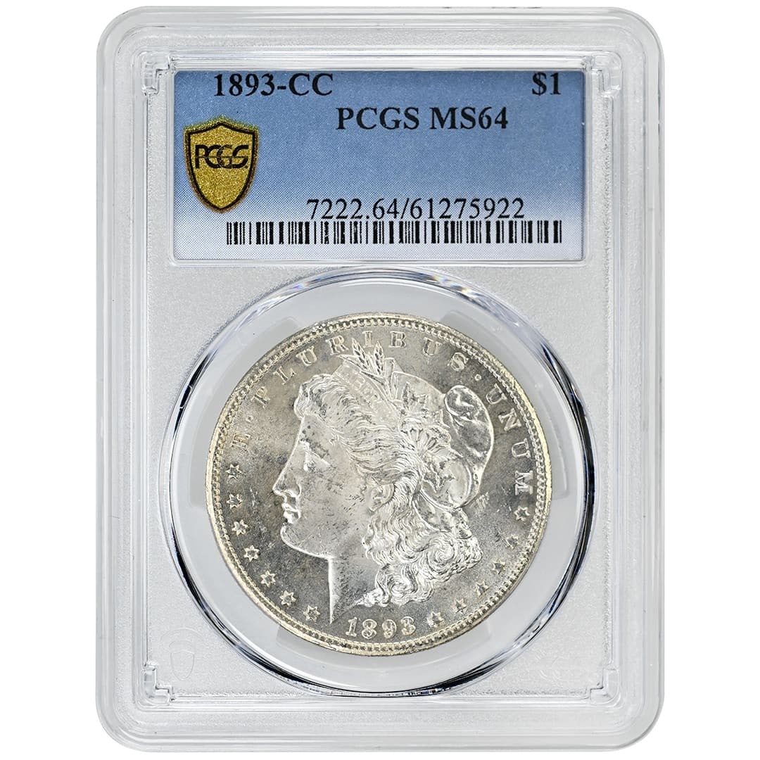 PCGS MS64 Carson City 1893-CC Morgan Silver Dollar Key Date: PCGS MS64 Carson City 1893-CC Morgan Silver Dollar Key Date This is an 1893-CC Morgan Silver Dollar, graded MS64 by PCGS. Produced at the Carson City Mint, this rare coin features a bright white appea