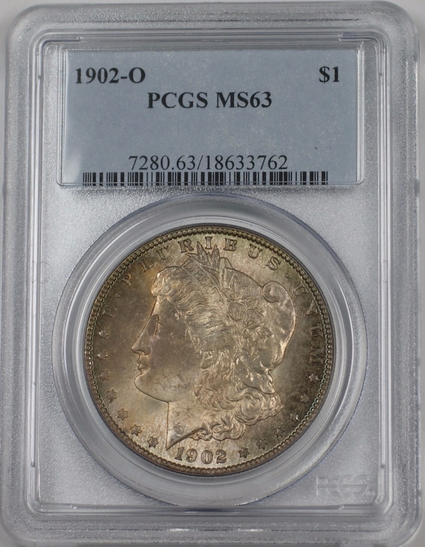 PCGS MS-63 Certified 1902-O Morgan Silver Dollar New Orleans Mint Toned: PCGS MS-63 Certified 1902-O Morgan Silver Dollar New Orleans Mint Toned This is a 1902-O Morgan Silver Dollar coin graded MS-63 by PCGS. The coin, minted in New Orleans, is uncirculated and features a
