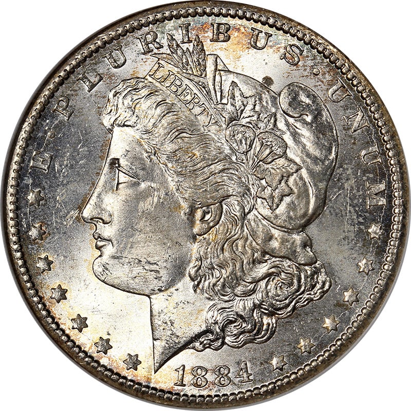 1884-CC Morgan Silver Dollar ANACS MS63 Uncirculated Silver Coin: 1884-CC Morgan Silver Dollar ANACS MS63 Uncirculated Silver Coin This exceptional 1884-CC Morgan Silver Dollar is certified by ANACS with a grade of MS63, showcasing great eye appeal and a strong stri