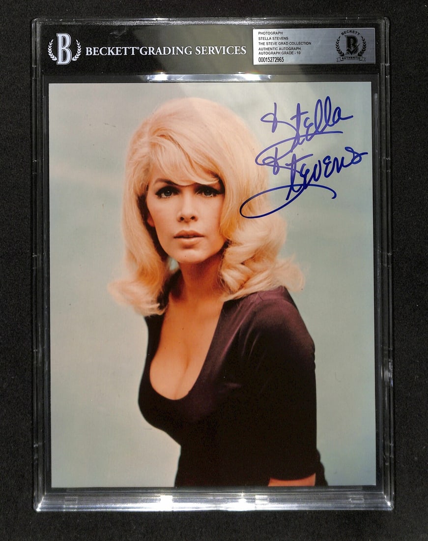Stella Stevens Signed 8x10 Photo with Perfect 10 Beckett Authentication: Stella Stevens Signed 8x10 Photo with Perfect 10 Beckett Authentication This autographed 8x10 color photograph features the signature of Stella Stevens, who passed away in 2023. The signature is writt