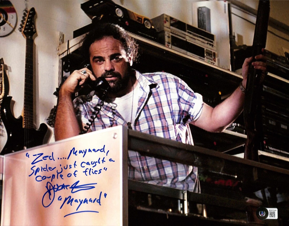 Duane Whitaker Pulp Fiction Maynard Signed 11x14 Photo Beckett Certified: Duane Whitaker Pulp Fiction Maynard Signed 11x14 Photo Beckett Certified This is an autographed 11x14 photograph of Duane Whitaker, who portrayed Maynard in the iconic film Pulp Fiction. The photograp