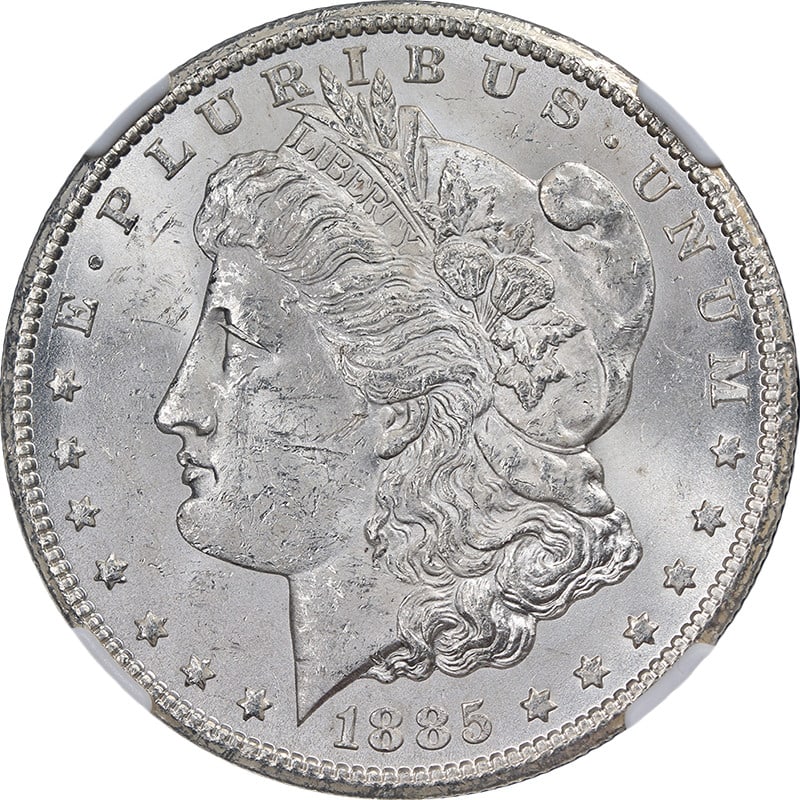 NGC Uncirculated 1885 Carson City Morgan Silver Dollar with Strong Strike: NGC Uncirculated 1885 Carson City Morgan Silver Dollar with Strong Strike This original 1885-CC Morgan Silver Dollar is certified by NGC as Brilliant Uncirculated. It features strong strike detail, br
