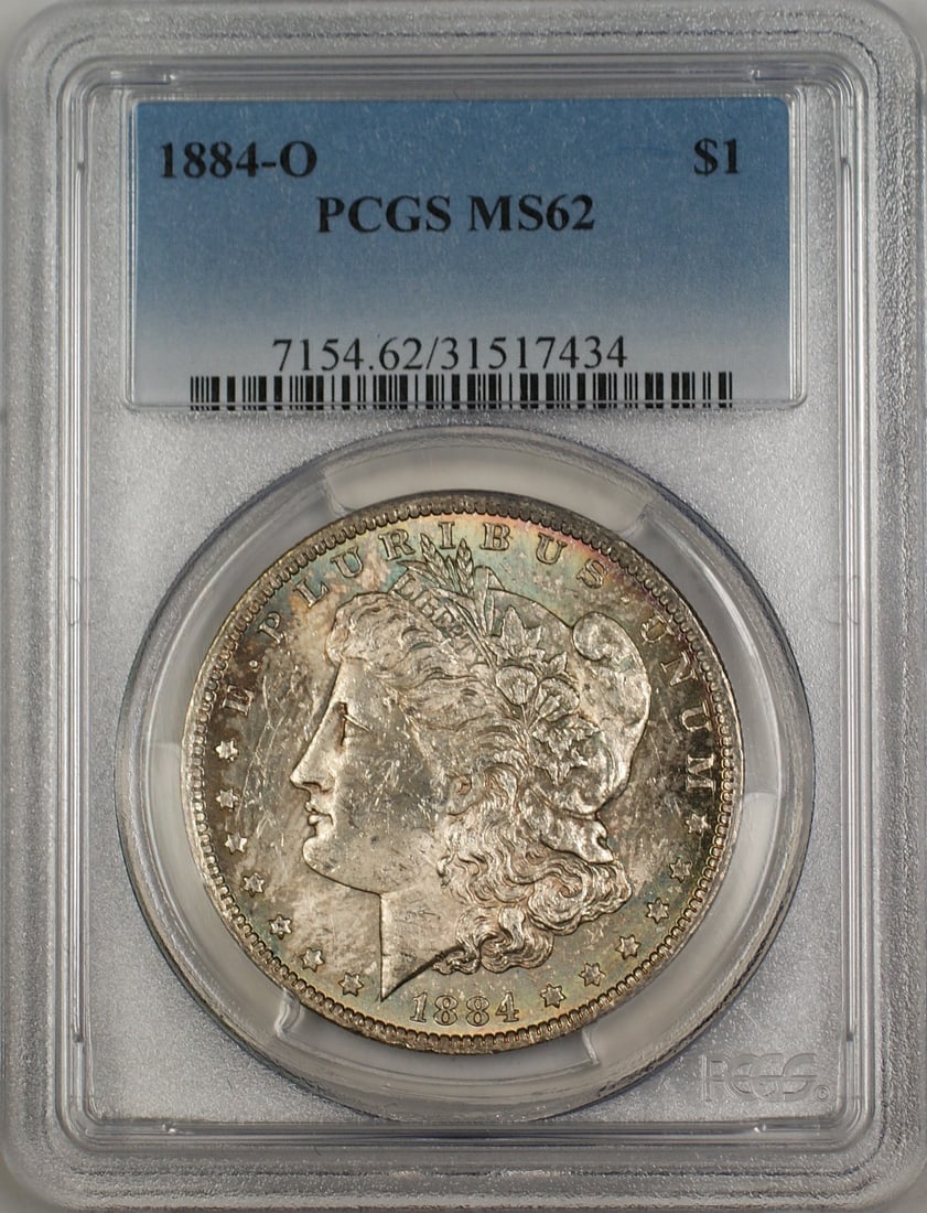 PCGS MS-62 New Orleans 1884-O Morgan Dollar Silver Coin With Colorful Toning: PCGS MS-62 New Orleans 1884-O Morgan Dollar Silver Coin With Colorful Toning This 1884-O Morgan Silver Dollar is a $1 coin graded MS-62 by PCGS. It is composed of silver, features a toned finish, and