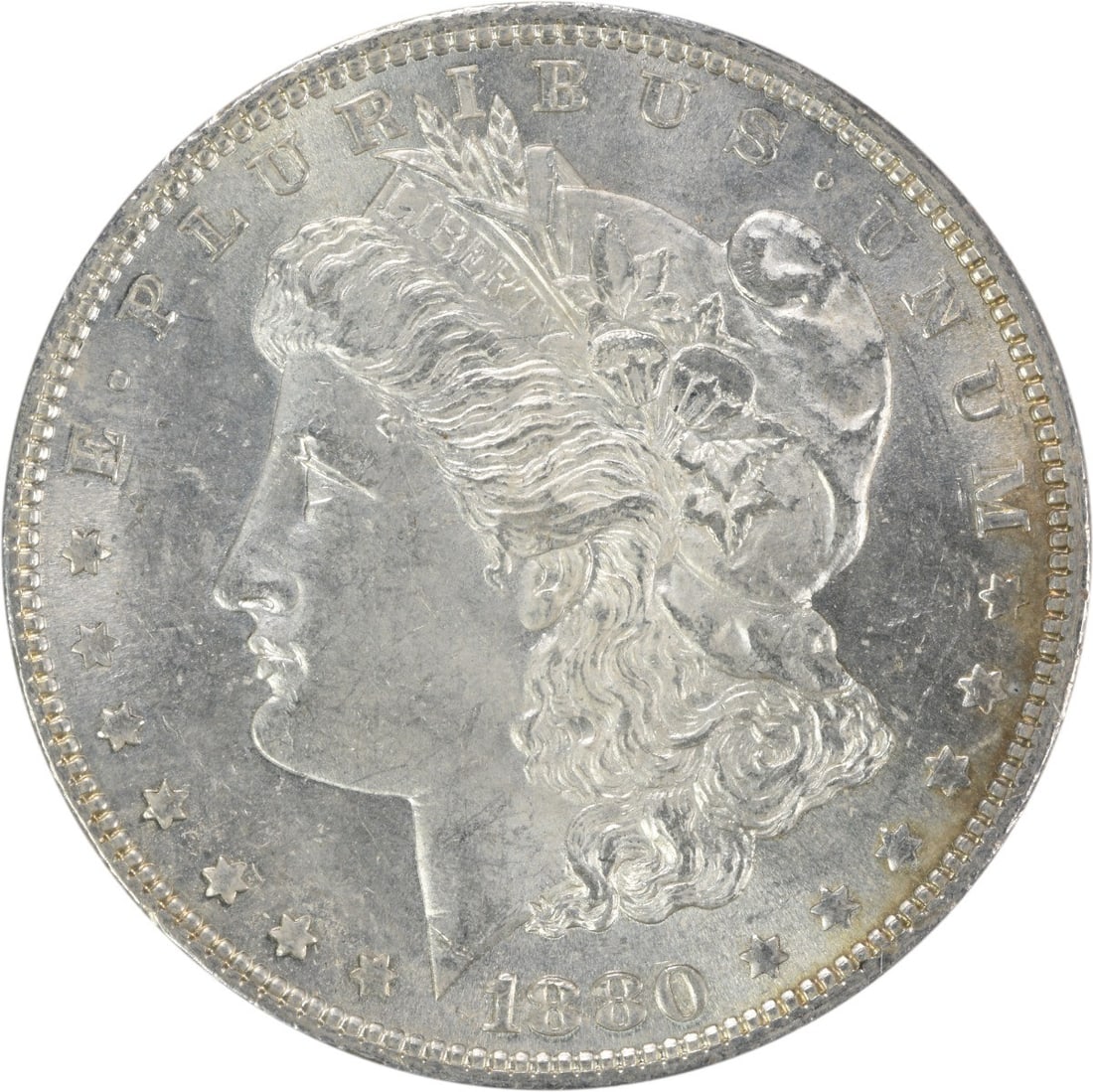 1880 Morgan Silver Dollar Uncertified Brilliant Uncirculated: 1880 Morgan Silver Dollar Uncertified Brilliant Uncirculated This 1880 Morgan Silver Dollar is a beautiful example of American coinage, showcasing exceptional brilliance in uncirculated condition. Str