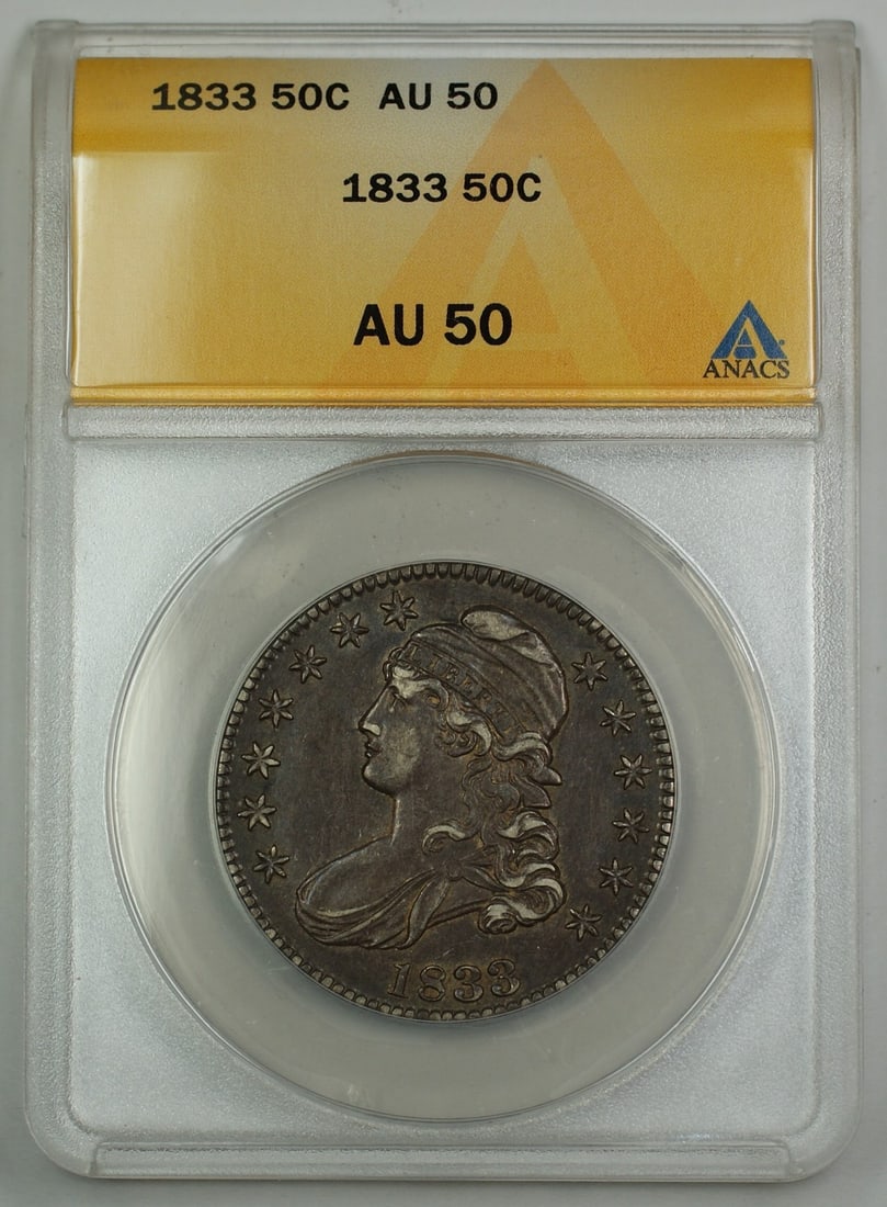 ANACS AU-50 1833 Silver Capped Bust Half Dollar Coin Philadelphia Mint: ANACS AU-50 1833 Silver Capped Bust Half Dollar Coin Philadelphia Mint This 1833 Capped Bust Half Dollar is a silver coin minted in Philadelphia. It is certified by ANACS with a grade of AU-50 and is