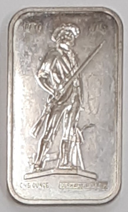 Limited Edition 1 Troy Ounce Minuteman .925 Silver Ingot SB 80: Limited Edition 1 Troy Ounce Minuteman .925 Silver Ingot SB 80 This limited edition Gorham Mint silver bar contains one troy ounce of .925 fine silver and features a design of the Minuteman Statue. Th