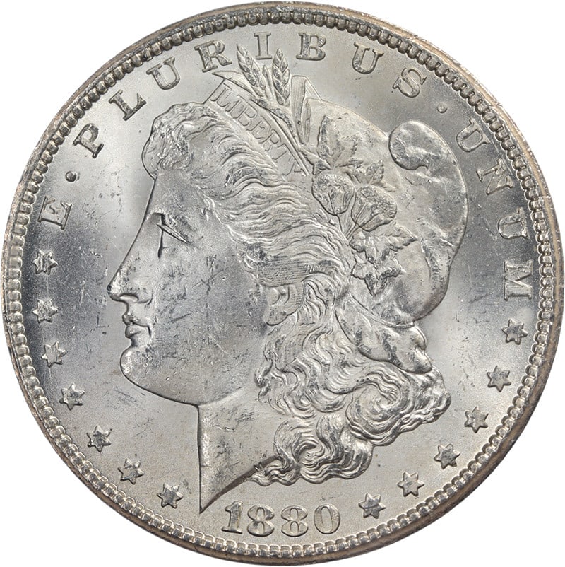 NGC MS63 1880-CC Morgan Silver Dollar GSA Holder Uncirculated: NGC MS63 1880-CC Morgan Silver Dollar GSA Holder Uncirculated This original 1880-CC GSA Morgan Silver Dollar is certified by NGC with a grade of MS63. Struck at the Carson City Mint, it features super