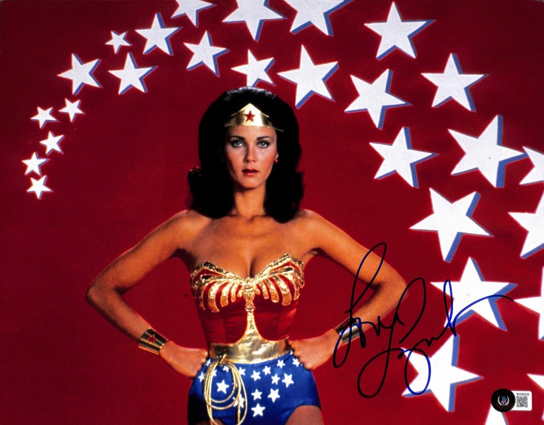 Lynda Carter Wonder Woman Signed 11x14 Photo Beckett Certified: Lynda Carter Wonder Woman Signed 11x14 Photo Beckett Certified This is a stunning 11x14 color photograph of Lynda Carter, famously known for her role as Wonder Woman, beautifully autographed in blue p