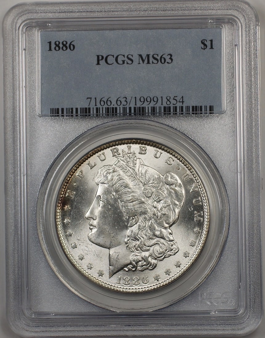 PCGS MS-63 1886 Morgan Silver Dollar Uncirculated Philadelphia $1 Coin: PCGS MS-63 1886 Morgan Silver Dollar Uncirculated Philadelphia $1 Coin This 1886 Morgan Silver Dollar is an uncirculated coin graded MS-63 by PCGS. Minted in Philadelphia, it features a composition of