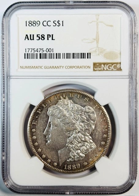 NGC AU-58 PL Carson City 1889 CC Morgan Silver Dollar Proof Like: NGC AU-58 PL Carson City 1889 CC Morgan Silver Dollar Proof Like This 1889 Carson City Morgan Silver Dollar is graded AU-58 Proof Like by NGC. Struck in silver and certified by NGC, it showcases the r