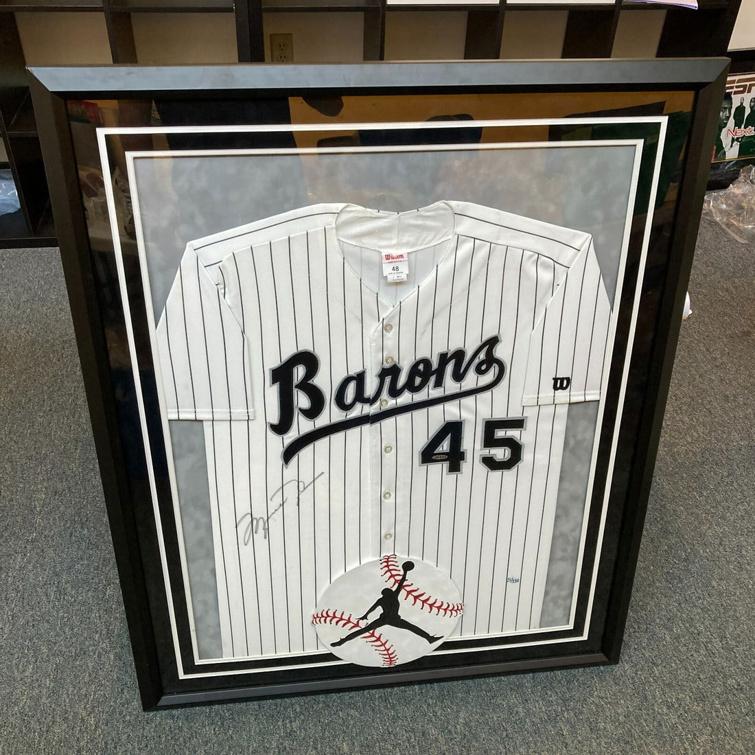 Michael Jordan Signed Birmingham Barons Jersey Framed with Upper Deck Authentication: Michael Jordan Signed Birmingham Barons Jersey Framed with Upper Deck Authentication This is a stunning original Birmingham Barons baseball jersey signed by basketball legend Michael Jordan. The jerse