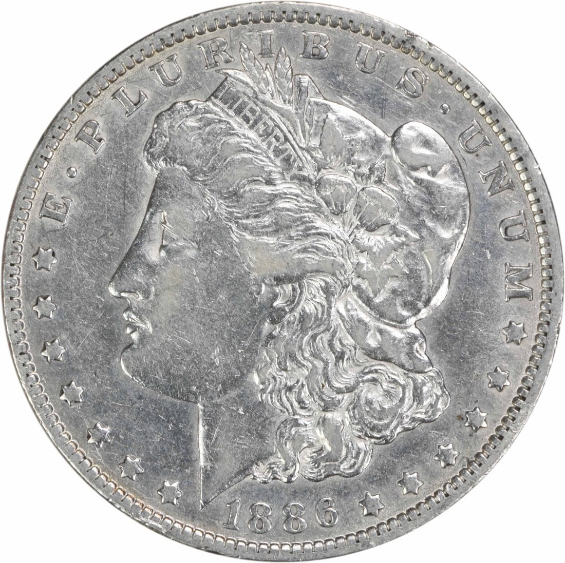Morgan Dollar 1886 New Orleans Mint Silver Coin EF Grade Uncertified: Morgan Dollar 1886 New Orleans Mint Silver Coin EF Grade Uncertified This 1886-O Morgan Silver Dollar is a circulated coin from the United States, featuring a composition of 90% silver and 10% copper.