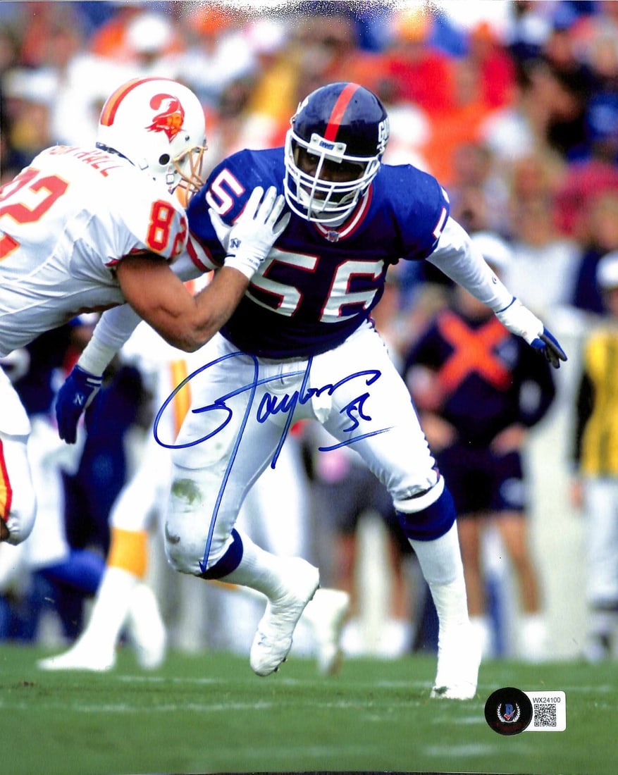 Lawrence Taylor Signed 8x10 Photo NY Giants Beckett Certified: Lawrence Taylor Signed 8x10 Photo NY Giants Beckett Certified This authentic 8x10 photograph features the legendary Lawrence Taylor of the New York Giants, hand-signed in blue permanent marker. The si