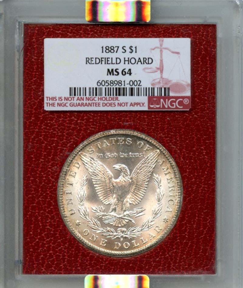 1887-S Morgan Dollar NGC MS64 Redfield Hoard Uncirculated: 1887-S Morgan Dollar NGC MS64 Redfield Hoard Uncirculated This 1887-S Morgan Dollar is a stunning piece that features a grade of MS64, certified by NGC, ensuring its high quality and uncirculated stat