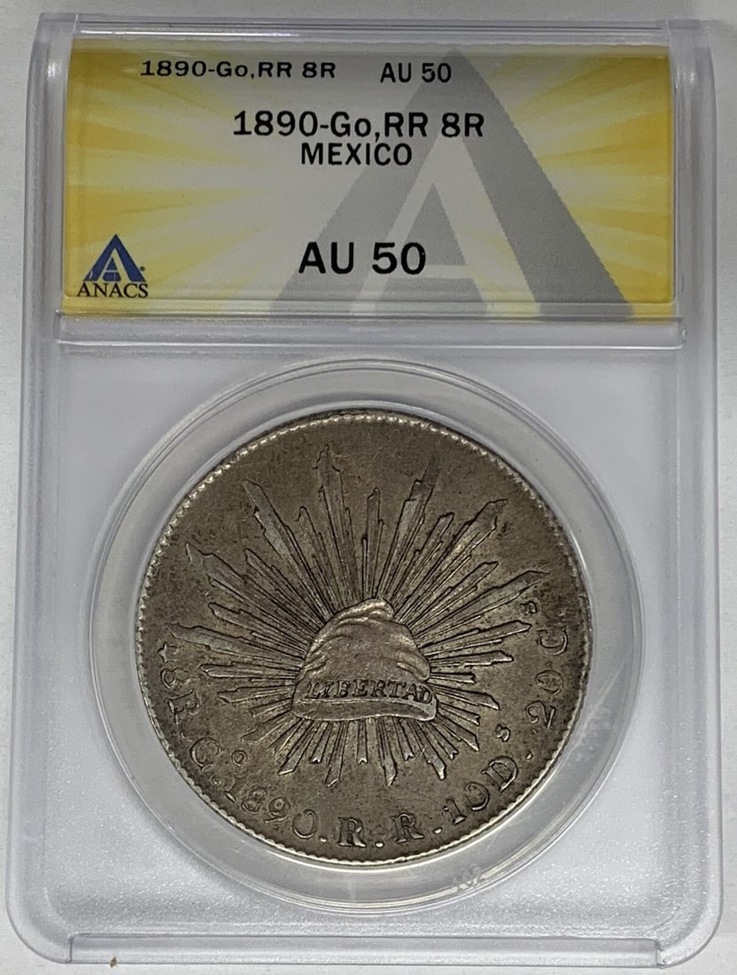 ANACS AU 50 1890 Mexico 8 Reales Silver Coin Go RR: ANACS AU 50 1890 Mexico 8 Reales Silver Coin Go RR This 1890-Go,RR Mexico 8 Reales coin from the Second Republic era is certified by ANACS with a grade of AU 50. Composed of silver, this pre-owned col