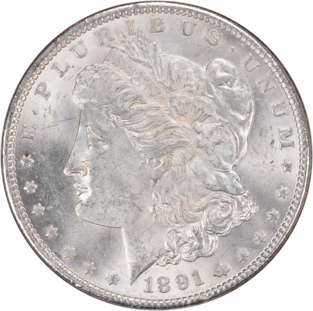 1891 Morgan Silver Dollar Doubled Ear Choice BU Uncertified: 1891 Morgan Silver Dollar Doubled Ear Choice BU Uncertified This 1891 VAM 2 Morgan Silver Dollar features a doubled ear and is graded as Choice Brilliant Uncirculated (BU). The coin is made of silver