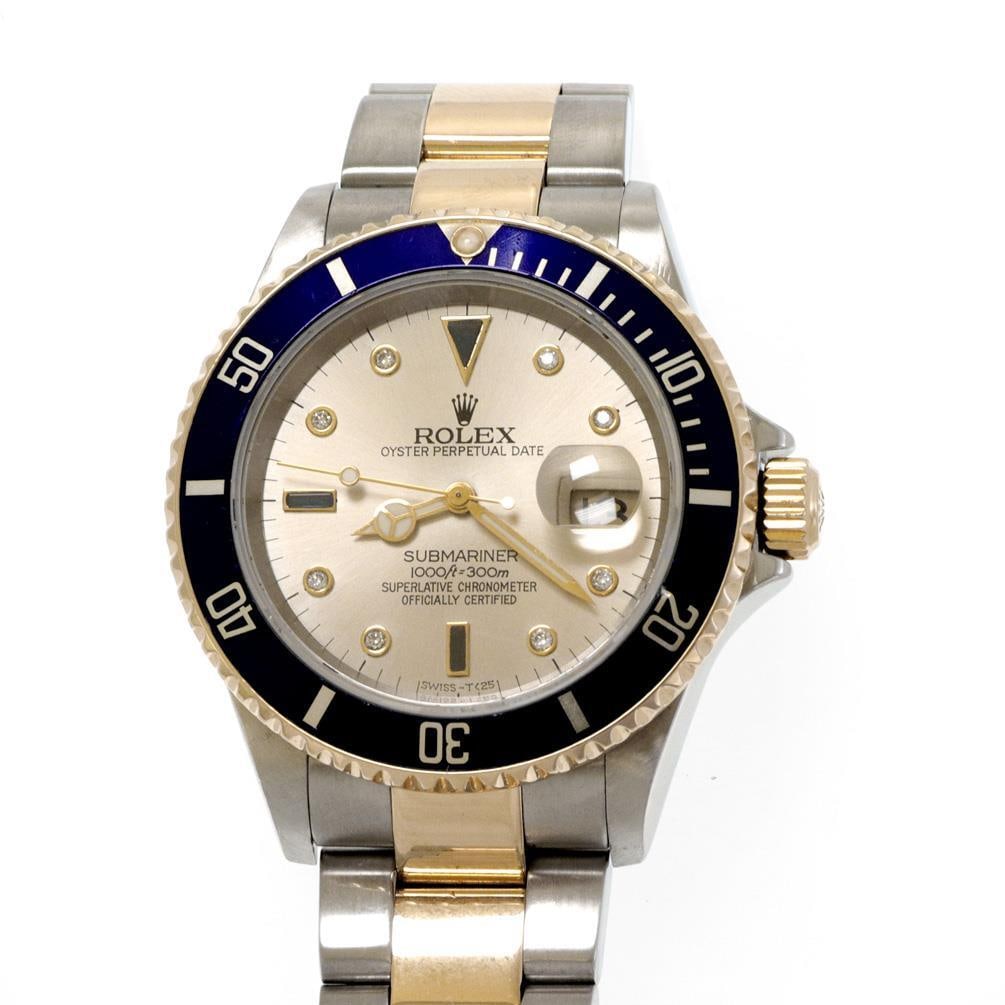 Rolex 16613 Submariner Date Steel Gold Men's Watch With Diamond Accents: Rolex 16613 Submariner Date Steel Gold Men's Watch With Diamond Accents This Rolex Oyster Perpetual Submariner Date wristwatch features a stainless steel case paired with an 18k yellow gold Oyster bra