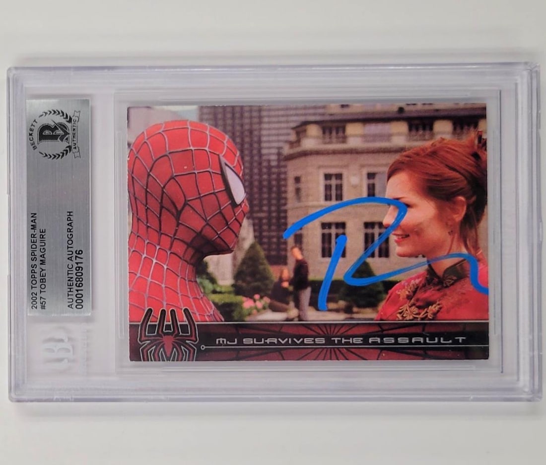 Tobey Maguire Autographed 2002 Topps Spider-Man #57 Trading Card PSA Authenticated: Tobey Maguire Autographed 2002 Topps Spider-Man #57 Trading Card PSA Authenticated This is a 2002 Topps Spider-Man #57 trading card, featuring an autographed signature of Tobey Maguire. The card is pa