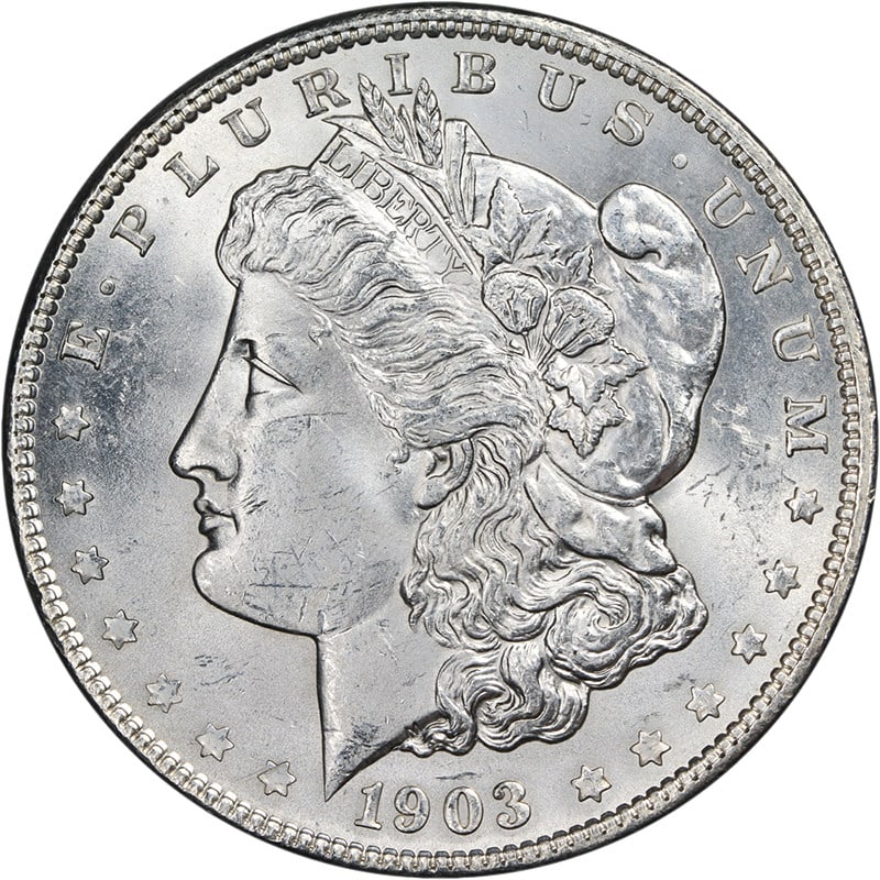 Choice Brilliant Uncirculated 1903-O Key Date Morgan Silver Dollar: Choice Brilliant Uncirculated 1903-O Key Date Morgan Silver Dollar This is an original 1903-O Morgan Silver Dollar featuring exceptional luster, bright white color, and well-preserved surfaces. Struck