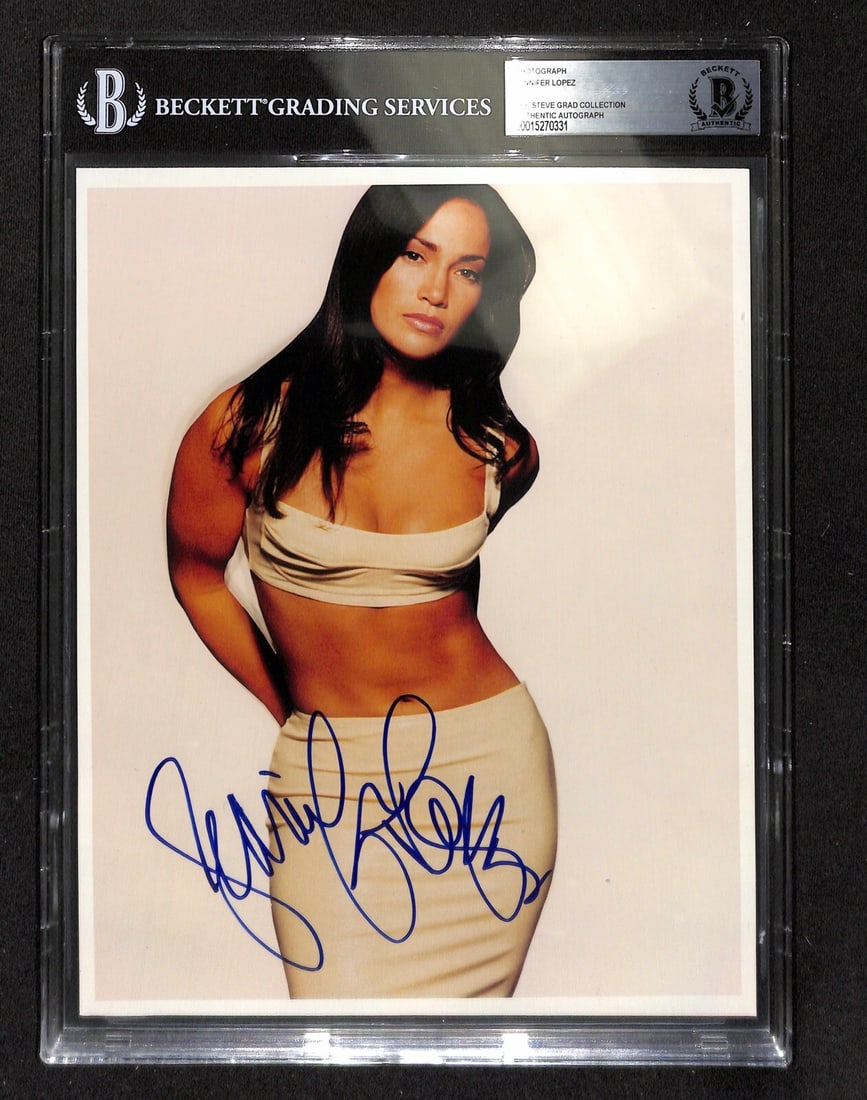 Jennifer Lopez Early Signed 8x10 Photo Beckett Authenticated: Jennifer Lopez Early Signed 8x10 Photo Beckett Authenticated This is an early signed 8x10 color photograph of Jennifer Lopez, showcasing her autograph in blue permanent marker. The photograph was pers