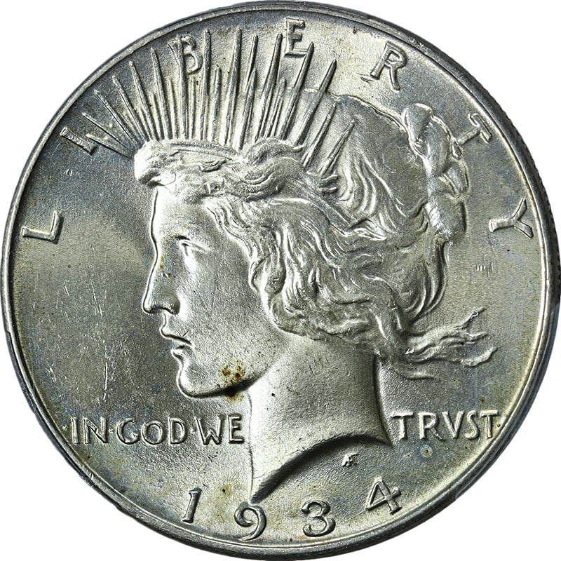 1934-P Peace Dollar PCGS MS64 Silver Coin Strong Luster: 1934-P Peace Dollar PCGS MS64 Silver Coin Strong Luster This 1934-P Peace Dollar is certified by PCGS with a grade of MS64, showcasing nice luster and a strong strike. It features a clean surface and