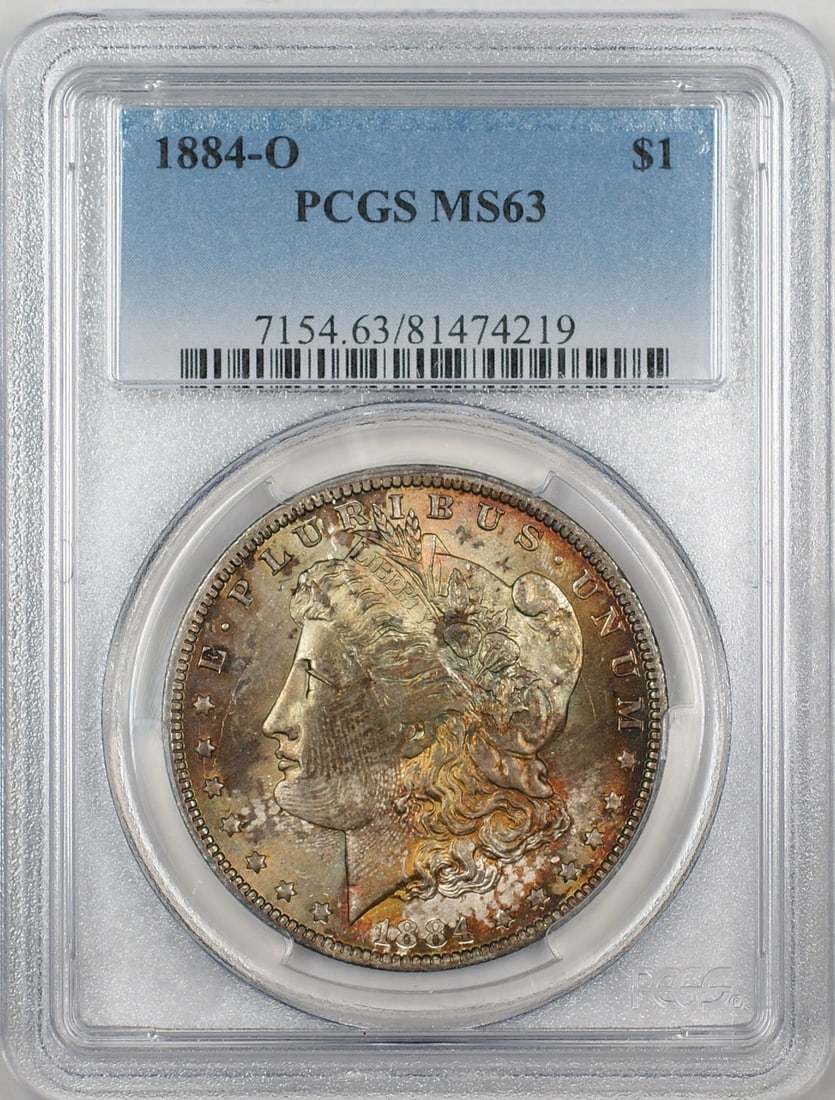 PCGS MS63 1884-O Morgan Dollar Silver Coin With Attractive Toning: PCGS MS63 1884-O Morgan Dollar Silver Coin With Attractive Toning This 1884-O Morgan Silver Dollar is a $1 coin certified by PCGS with a grade of MS 63. Struck in New Orleans, it features a nicely ton