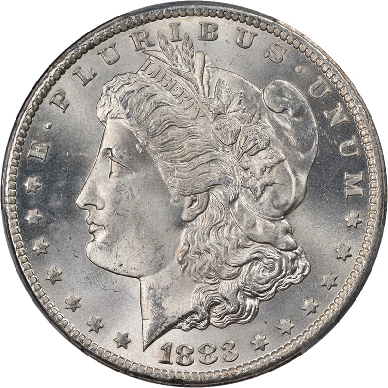 1883-CC Morgan Silver Dollar PCGS MS64 Uncirculated Stunning Luster: 1883-CC Morgan Silver Dollar PCGS MS64 Uncirculated Stunning Luster This 1883-CC Morgan Silver Dollar is certified by PCGS with a grade of MS64, showcasing great eye appeal, fantastic luster, and a st