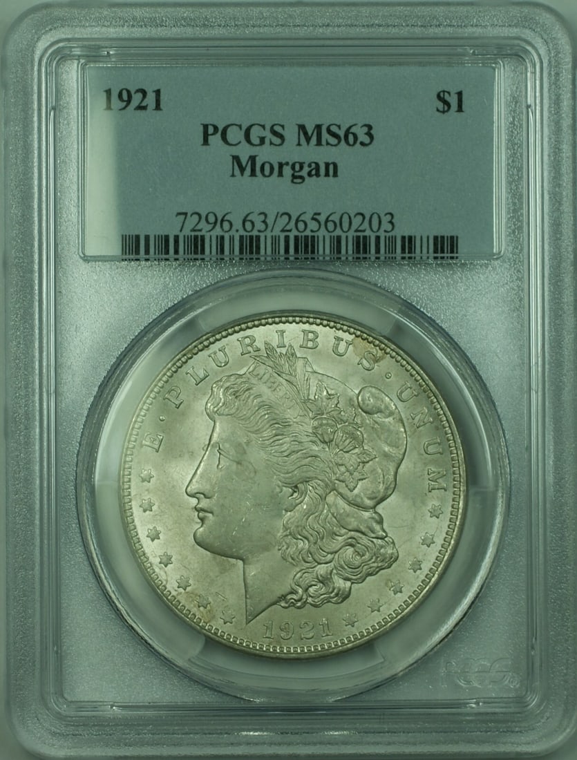 PCGS MS-63 1921 Morgan $1 Silver Dollar Coin: PCGS MS-63 1921 Morgan $1 Silver Dollar Coin This is a 1921 Morgan Silver Dollar $1 coin graded MS-63 by PCGS. The coin is composed of 90% silver and was minted in Philadelphia. It remains in uncircul