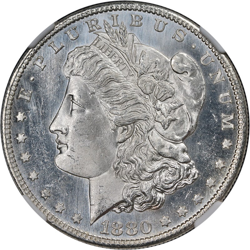 1880-S Morgan Silver Dollar NGC MS63 PL Blast White Coin: 1880-S Morgan Silver Dollar NGC MS63 PL Blast White Coin This stunning 1880-S Morgan Silver Dollar, graded NGC MS63 PL, showcases superb eye appeal with a brilliant white finish and exceptional luster