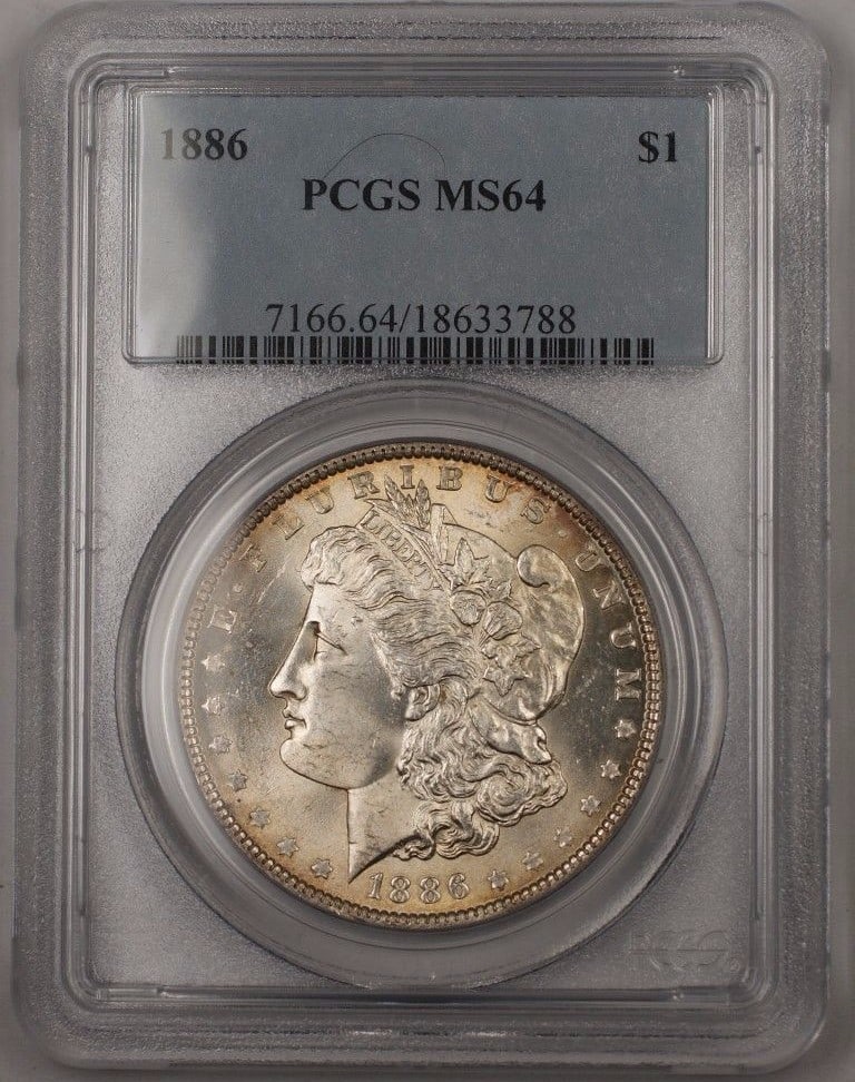 PCGS MS-64 1886 Morgan Dollar Silver Coin Lightly Toned Philadelphia Mint: PCGS MS-64 1886 Morgan Dollar Silver Coin Lightly Toned Philadelphia Mint This 1886 US Morgan Silver Dollar features a lightly toned finish and is certified by PCGS with a grade of MS 64. The coin was