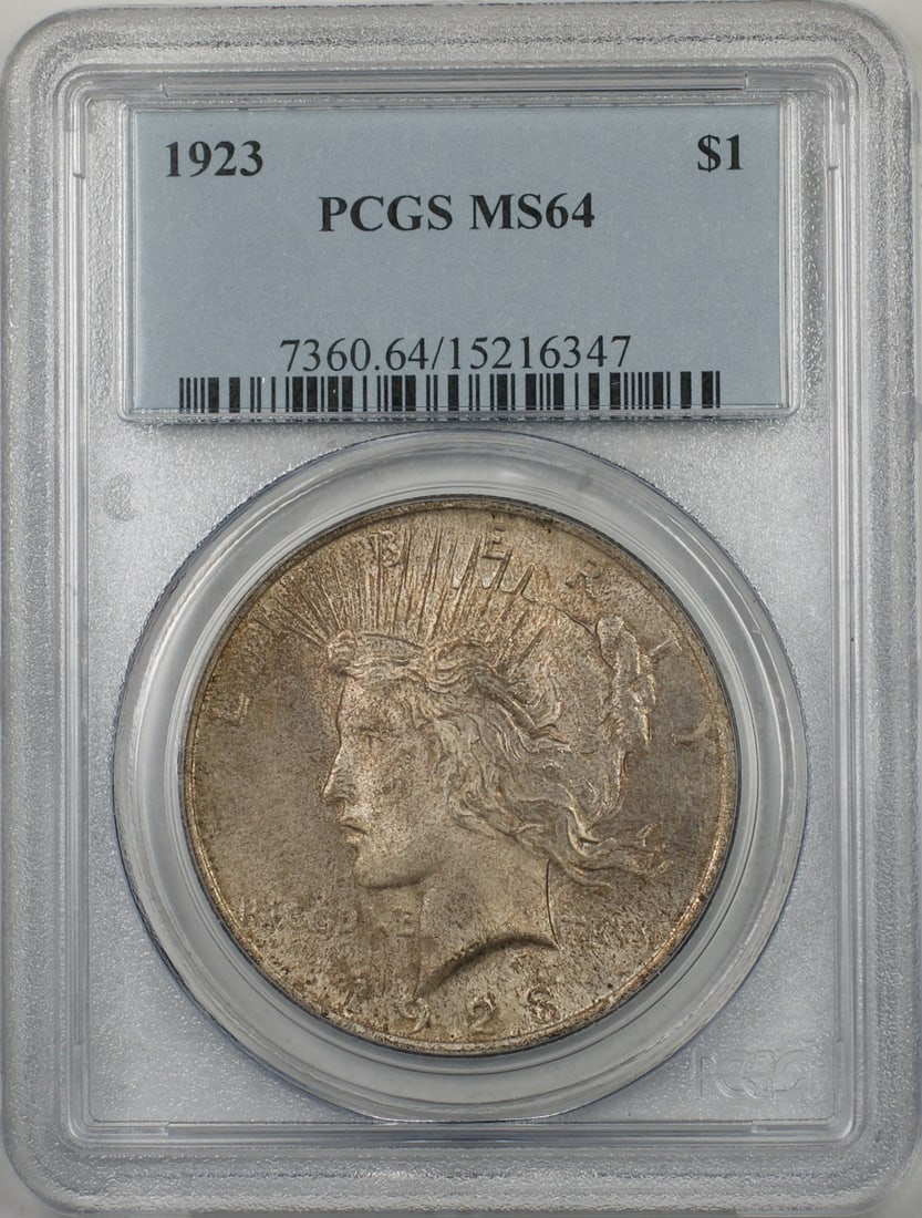 PCGS MS 64 1923 Peace Dollar Silver Coin Toned Philadelphia Mint: PCGS MS 64 1923 Peace Dollar Silver Coin Toned Philadelphia Mint This 1923 Silver Peace Dollar is certified by PCGS with a grade of MS-64, indicating it is in uncirculated condition. The coin features