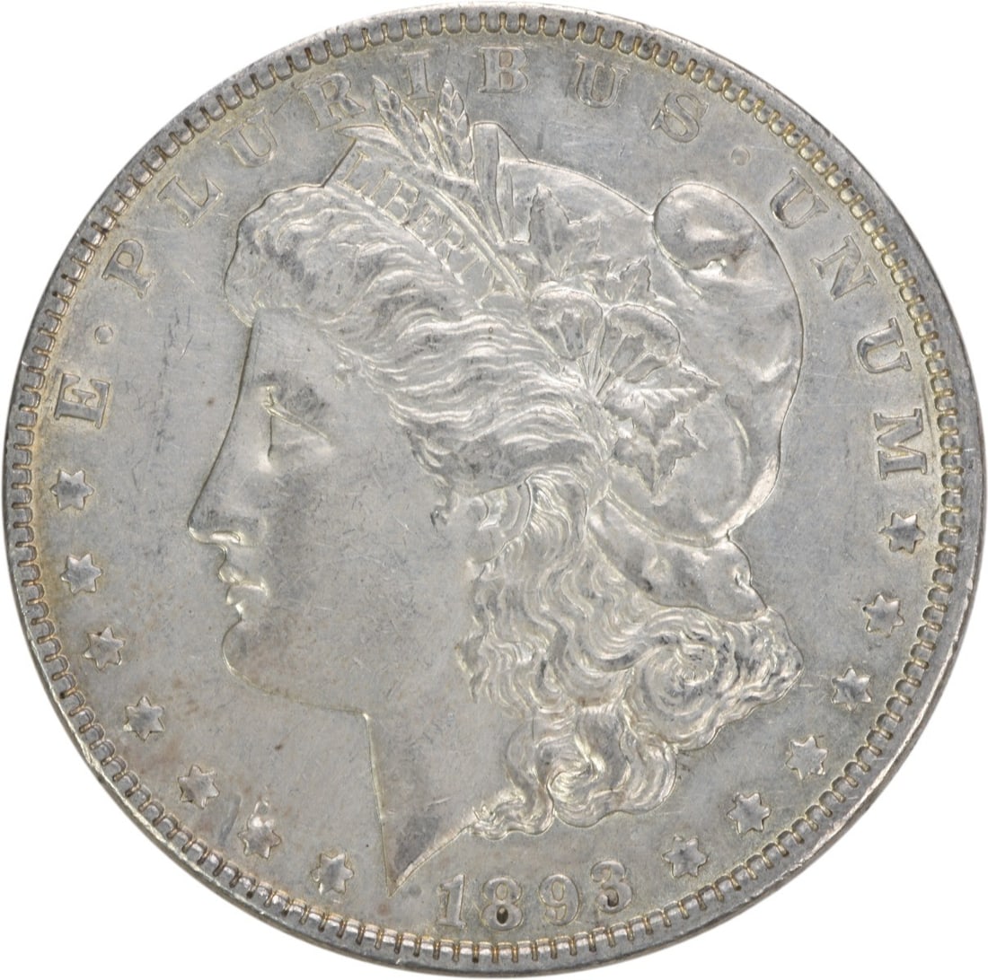 1893 Morgan Silver Dollar AU 90% Silver Uncertified Coin: 1893 Morgan Silver Dollar AU 90% Silver Uncertified Coin This 1893 Morgan Silver Dollar is a captivating piece of numismatic history, showcasing the iconic design by George T. Morgan. Struck in Philad