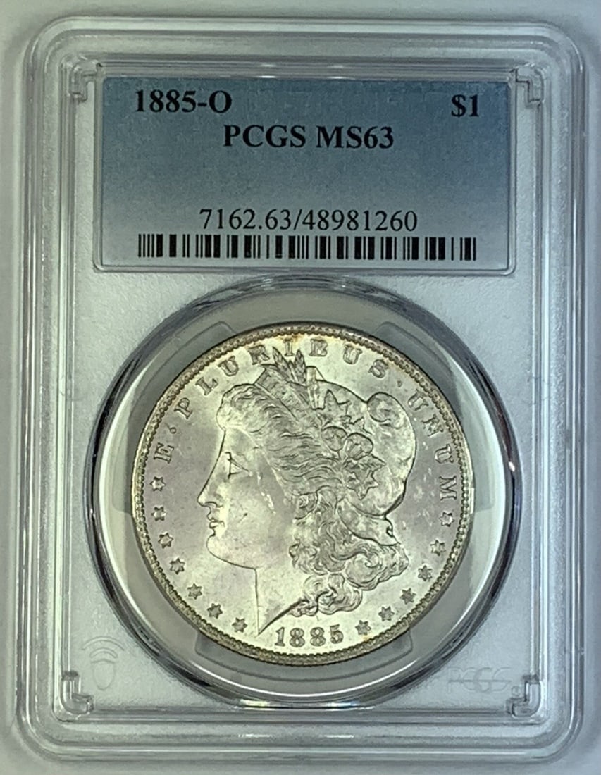 PCGS MS 63 1885-O Silver Morgan Dollar Uncirculated US Coin: PCGS MS 63 1885-O Silver Morgan Dollar Uncirculated US Coin This 1885-O Morgan Silver Dollar is an uncirculated coin certified by PCGS with a grade of MS 63. Struck in silver, this coin originates fro