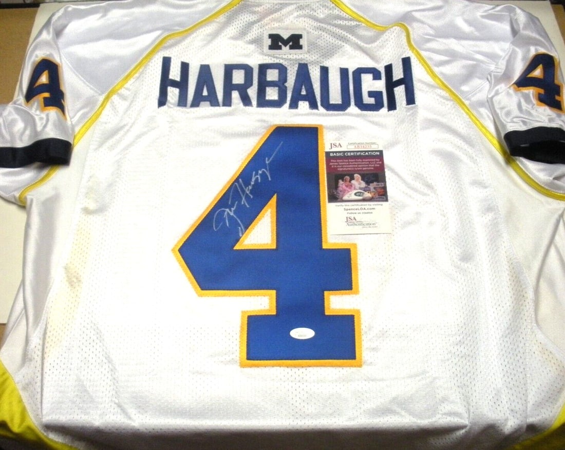 Jim Harbaugh Signed Michigan Wolverines Adidas Jersey JSA COA: Jim Harbaugh Signed Michigan Wolverines Adidas Jersey JSA COA This officially licensed Adidas jersey is signed by Jim Harbaugh, the renowned football coach and former player for the Michigan Wolverine
