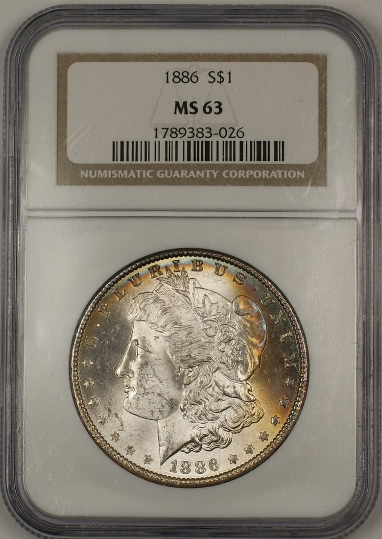 NGC MS63 1886 Philadelphia Morgan Silver Dollar with Attractive Toning: NGC MS63 1886 Philadelphia Morgan Silver Dollar with Attractive Toning This 1886 Morgan Silver Dollar is an uncirculated $1 coin graded MS 63 by NGC. Featuring attractive toning, it was minted in Phil