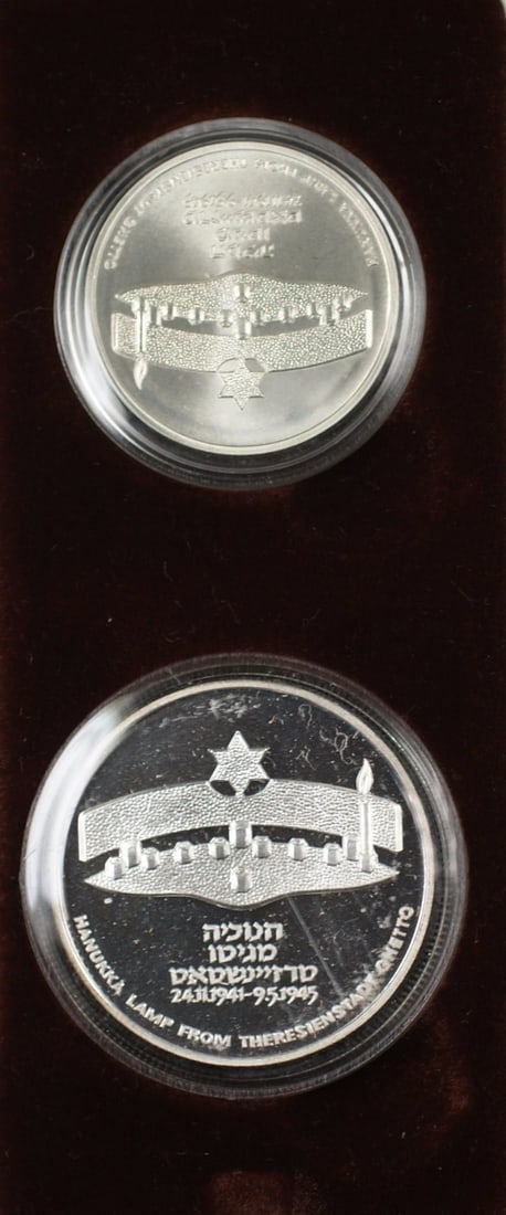 Israel 1984 Hanukka Theresienstadt Silver Two Coin Proof and Uncirculated Set No COA: Israel 1984 Hanukka Theresienstadt Silver Two Coin Proof and Uncirculated Set No COA This set features two 1984 Israel Sheqalim Hanukka coins commemorating Theresienstadt. Included are one uncirculate