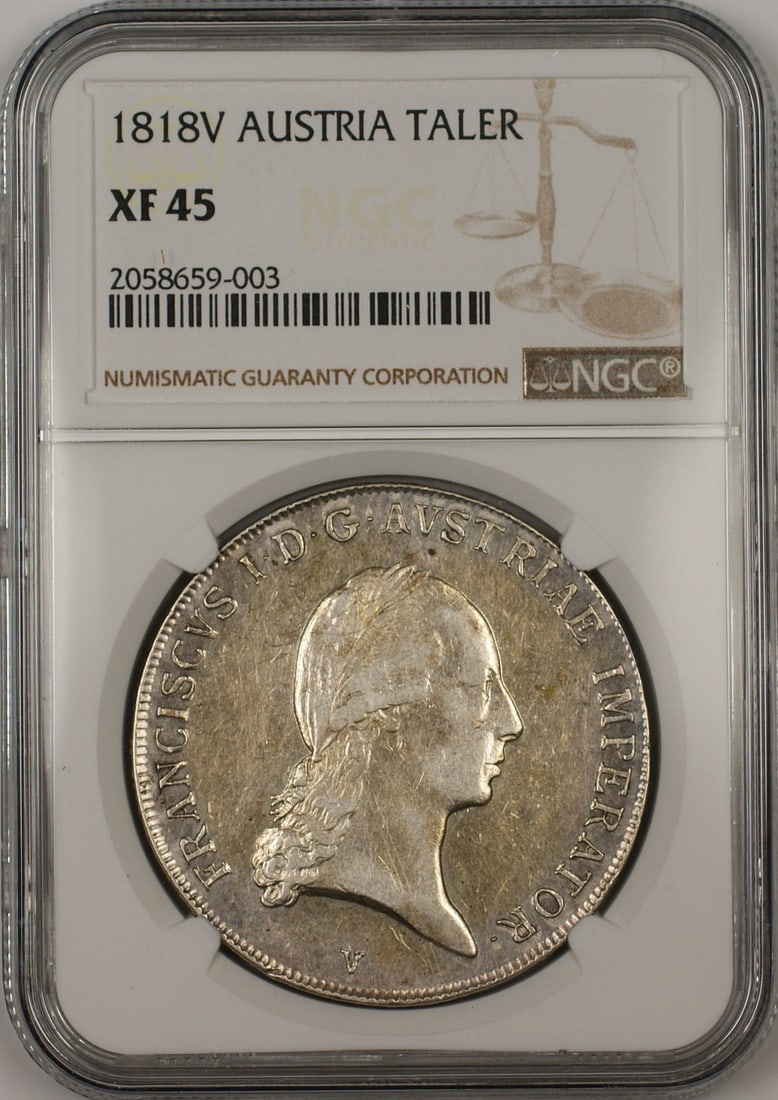 1818 Austria Silver Taler Certified XF-45 by NGC: 1818 Austria Silver Taler Certified XF-45 by NGC This 1818V Austria Silver Taler coin has been certified by NGC with a grade of XF-45. It is composed of silver and originates from Austria. The coin is