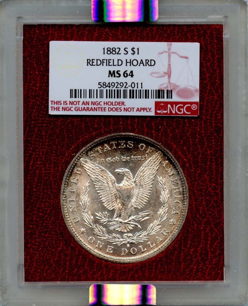 1882-S Morgan Dollar Redfield Hoard NGC MS64 Uncirculated: 1882-S Morgan Dollar Redfield Hoard NGC MS64 Uncirculated This 1882-S Morgan Dollar is a remarkable piece, certified by NGC with a grade of MS64, indicating its uncirculated condition. Minted in San F