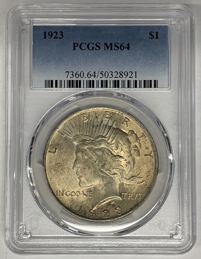 PCGS MS 64 1923 Peace Dollar Silver Coin With Toning: PCGS MS 64 1923 Peace Dollar Silver Coin With Toning This is a 1923 Peace Silver Dollar coin from the United States, featuring attractive toning. The coin is composed of silver, has a denomination of