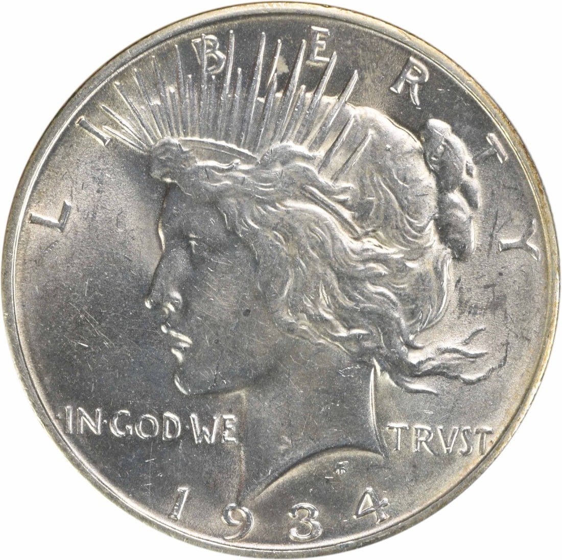 1934-D Peace Silver Dollar AU Uncertified 90% Silver Coin: 1934-D Peace Silver Dollar AU Uncertified 90% Silver Coin This 1934-D Peace Silver Dollar features the iconic design by Anthony de Francisci, representing peace and tranquility. It has been classified