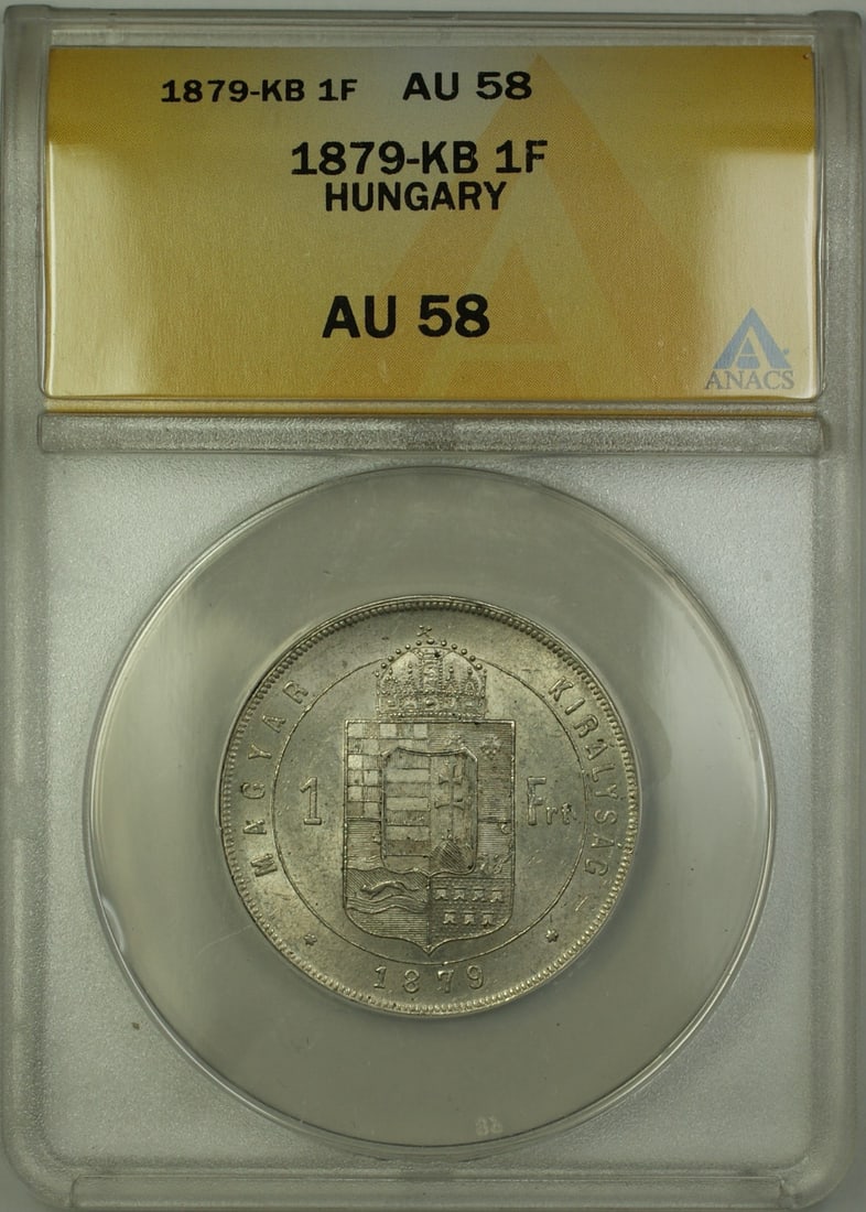 ANACS AU 58 1879-KB Hungary Silver 1 Forint Certified Coin: ANACS AU 58 1879-KB Hungary Silver 1 Forint Certified Coin This is an 1879-KB Hungary 1 Forint silver coin, certified by ANACS with a grade of AU-58. The coin is composed of silver and is from Hungary